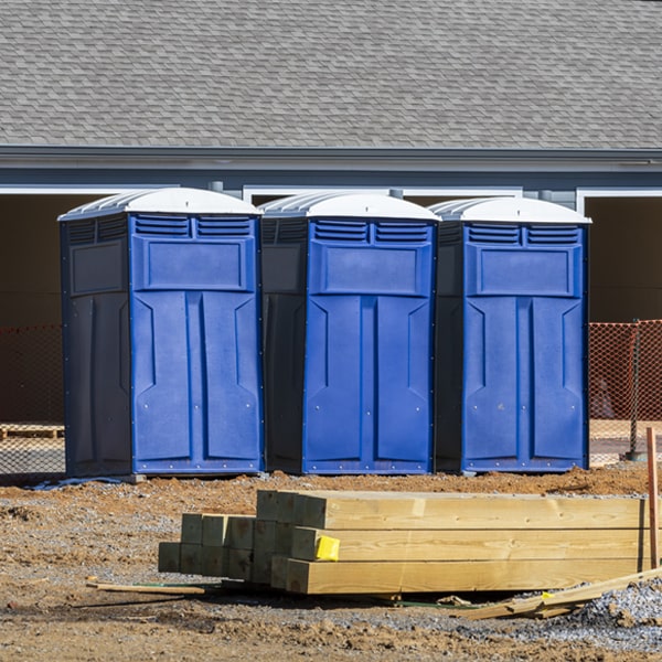 what is the cost difference between standard and deluxe portable toilet rentals in Upper Tract